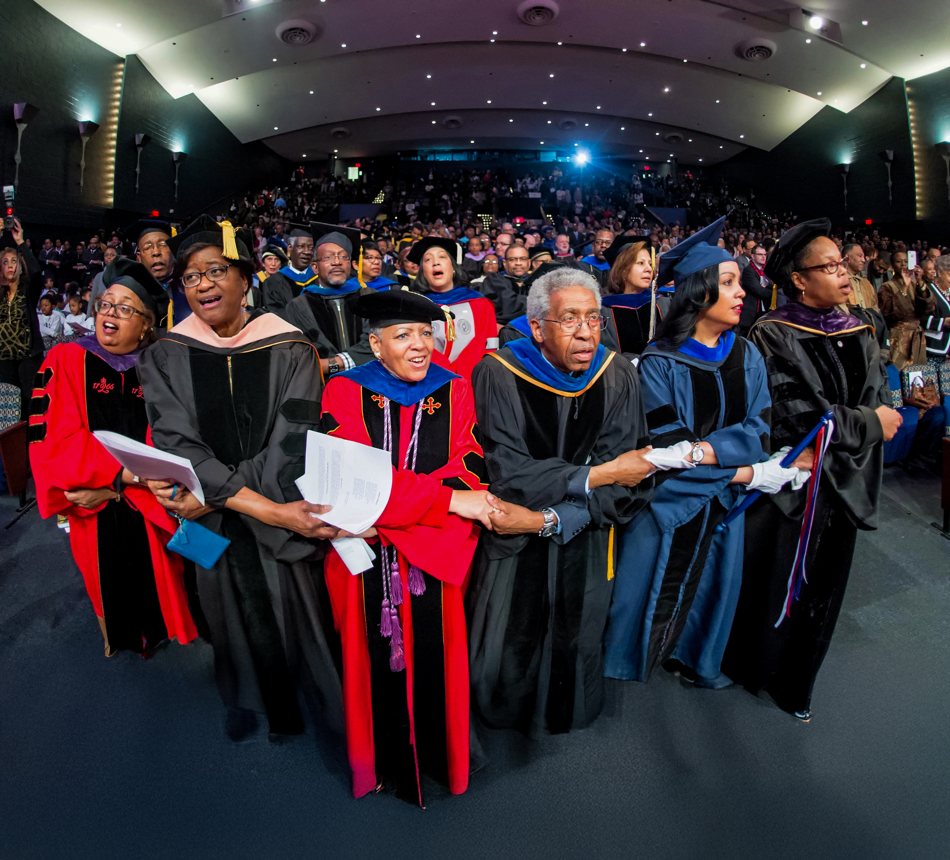 Charter Day hand holding