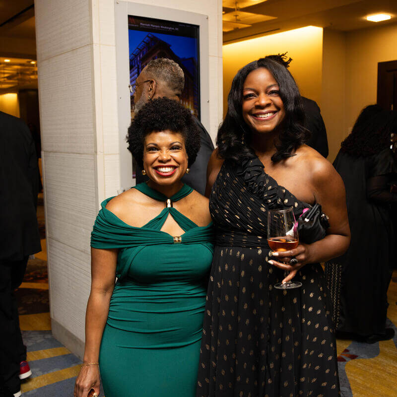 Charter Day Dinner guests smiling