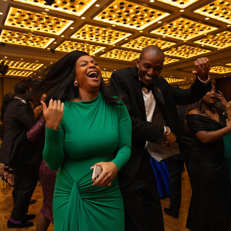 Charter Day Dinner guests laughing