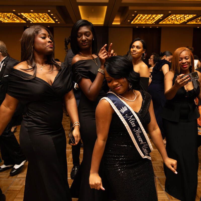 Charter Day Dinner guests dancing