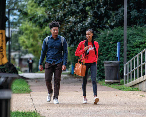students walking on campus